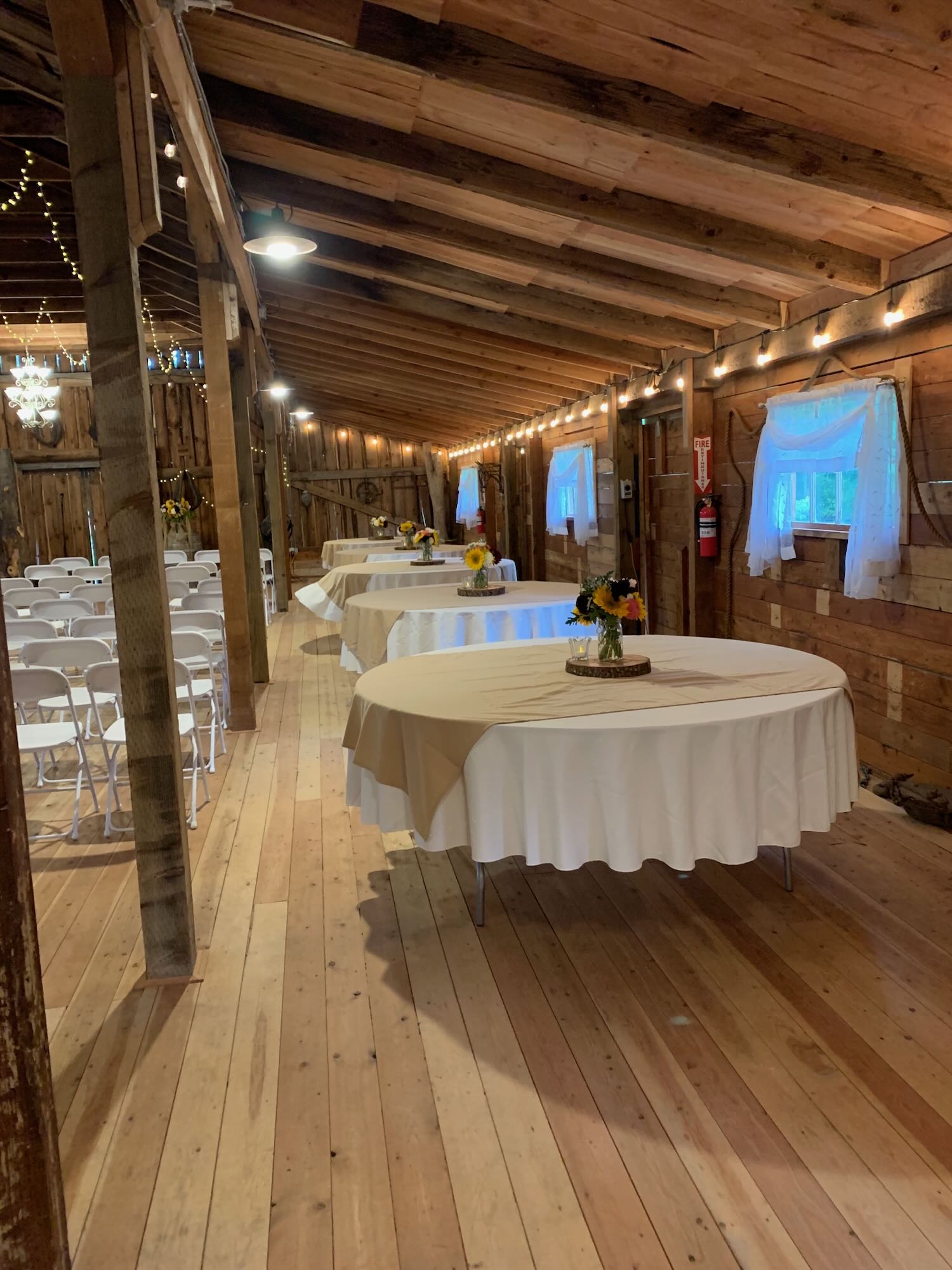 Round Tables on side with seating area in middle